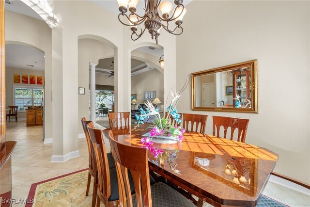 dining area with a notable chandelier