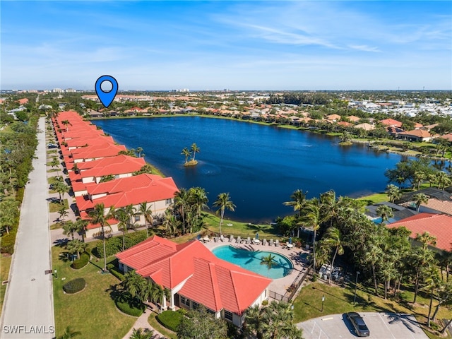 drone / aerial view with a water view