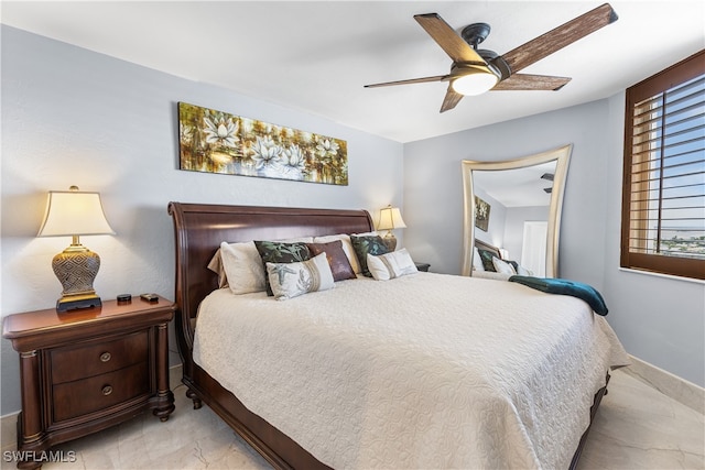 bedroom featuring ceiling fan