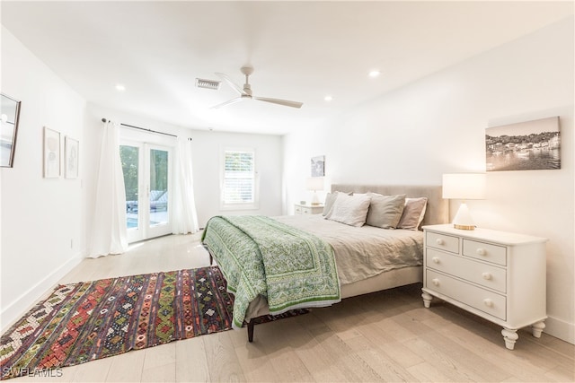 bedroom with ceiling fan, light hardwood / wood-style flooring, and access to outside