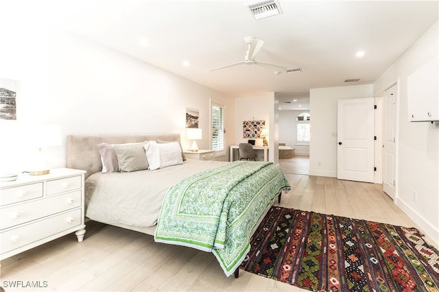 bedroom featuring ceiling fan and light wood-type flooring