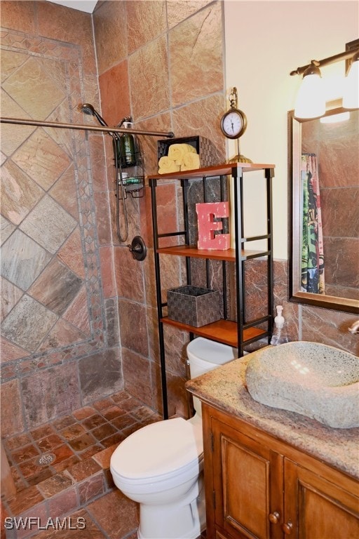 bathroom featuring vanity, a shower with curtain, and toilet