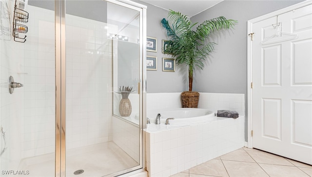 bathroom with plus walk in shower and tile patterned floors