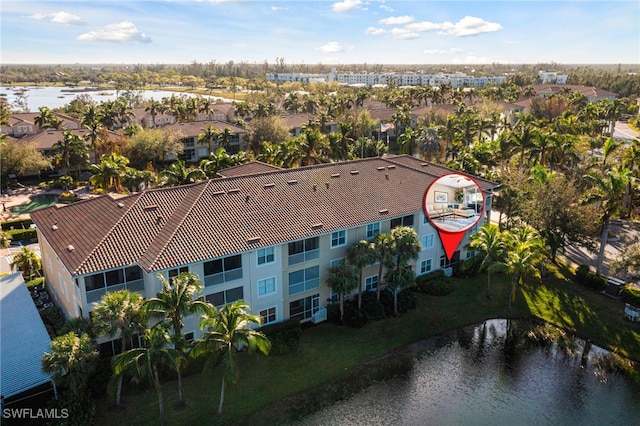 drone / aerial view featuring a water view