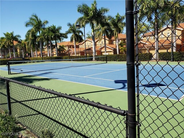 14801 Reflection Key Cir Unit 212, Fort Myers, FL 33907 - view of tennis court with fence
