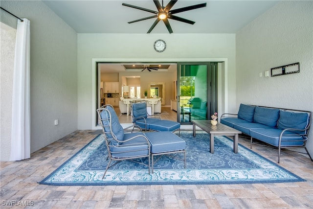 view of patio / terrace with an outdoor hangout area and ceiling fan