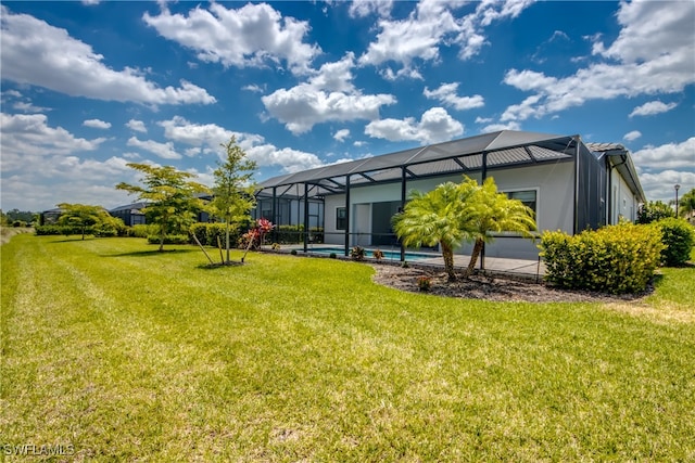 view of yard with a lanai