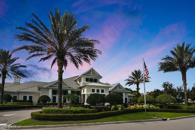 view of front of house with a lawn