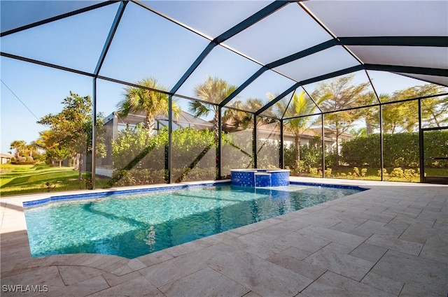 view of pool with glass enclosure and an in ground hot tub