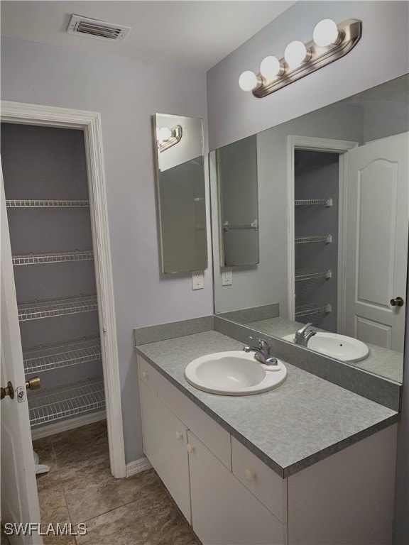 bathroom featuring vanity and tile patterned floors