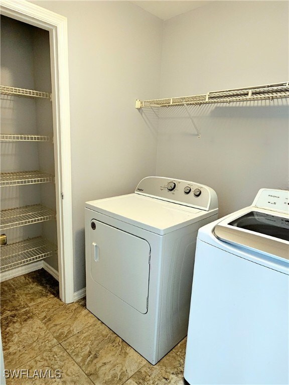 laundry room featuring washer and dryer