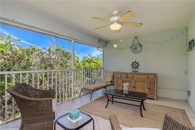 sunroom / solarium with ceiling fan