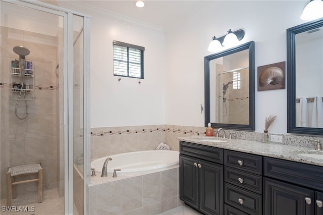 bathroom with separate shower and tub, vanity, and crown molding