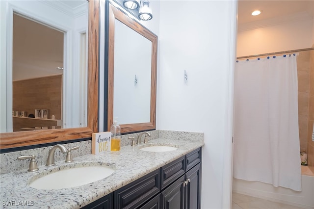 bathroom featuring shower / tub combo with curtain, vanity, tile patterned floors, and ornamental molding