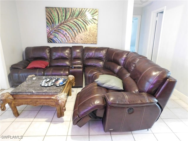 living room with light tile patterned floors