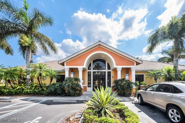 8550 Kingbird Loop Unit 618, Estero, FL 33967 - view of property featuring uncovered parking