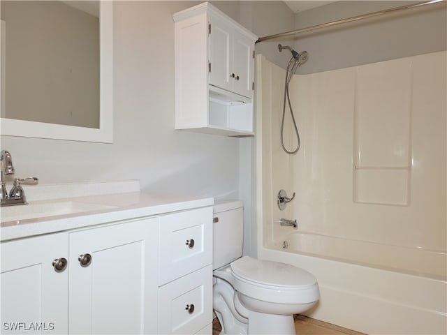 full bathroom with toilet, shower / washtub combination, and vanity