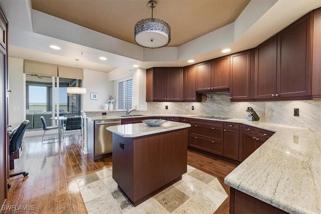 4875 Pelican Colony Blvd Unit 304, Bonita Springs, FL 34134 - kitchen featuring stainless steel dishwasher, tasteful backsplash, healthy amount of natural light, black electric cooktop, and recessed lighting