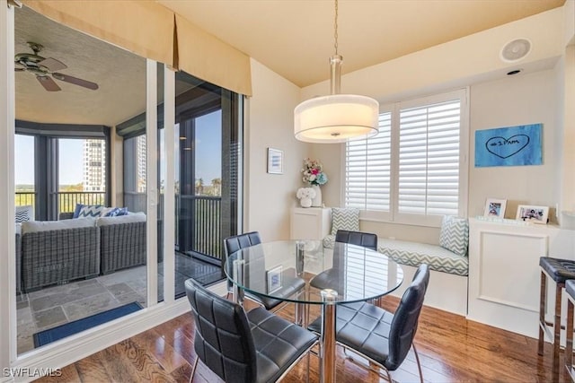 4875 Pelican Colony Blvd Unit 304, Bonita Springs, FL 34134 - dining space featuring wood finished floors, healthy amount of natural light, and ceiling fan