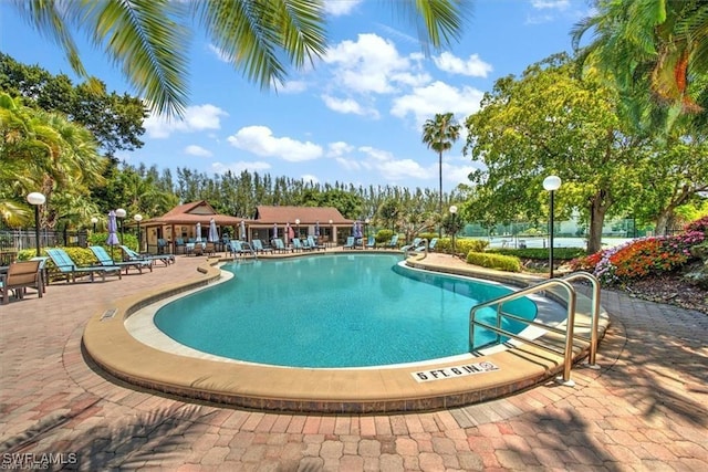 view of pool with a patio and a gazebo