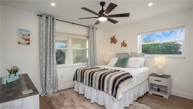 bedroom featuring ceiling fan and wood-type flooring