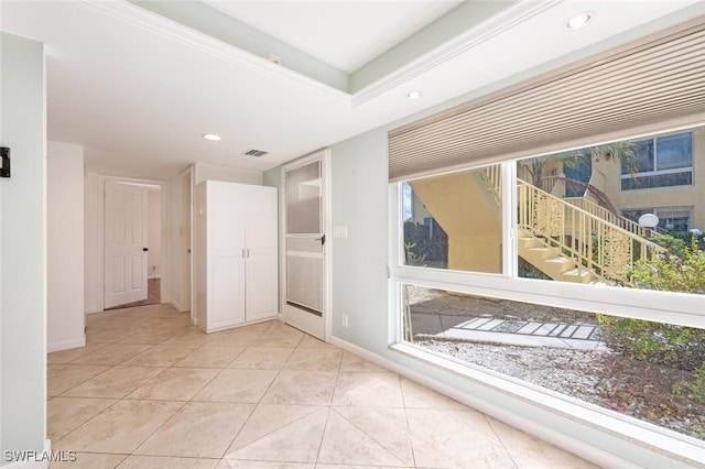 empty room with light tile patterned floors