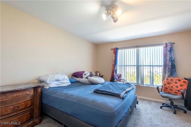 bedroom featuring carpet flooring