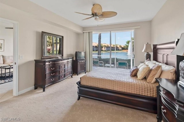 bedroom featuring ceiling fan, light colored carpet, and access to outside