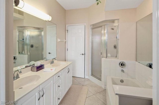 bathroom with vanity, tile patterned floors, and independent shower and bath