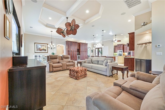 tiled living room featuring beamed ceiling, crown molding, coffered ceiling, and ceiling fan with notable chandelier