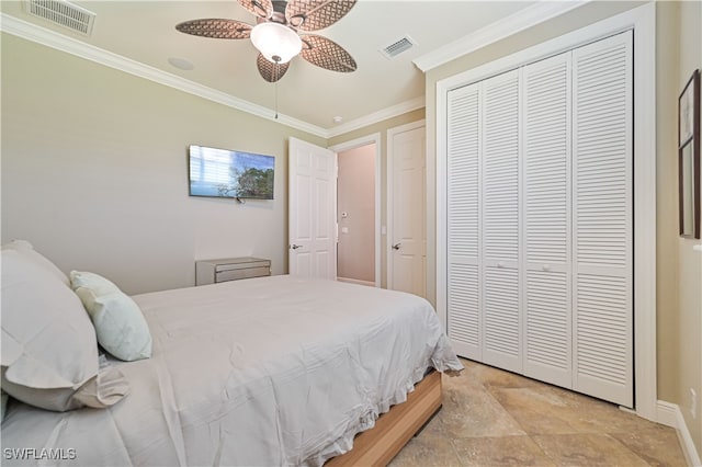 bedroom featuring a closet, ceiling fan, and ornamental molding