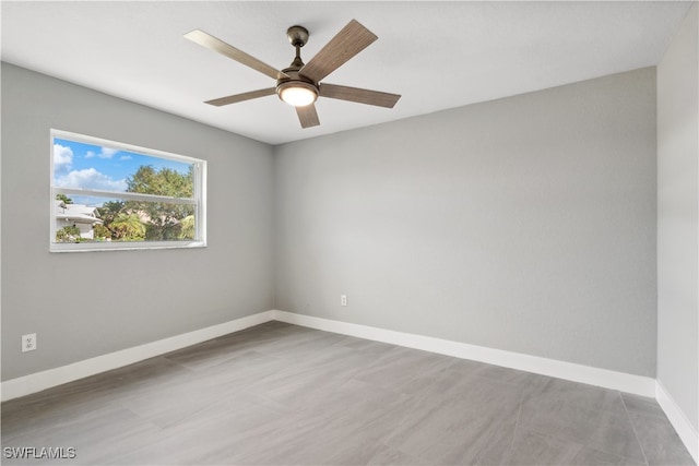 empty room featuring ceiling fan