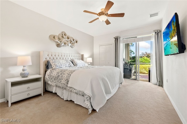 bedroom with ceiling fan, light colored carpet, a closet, and access to outside