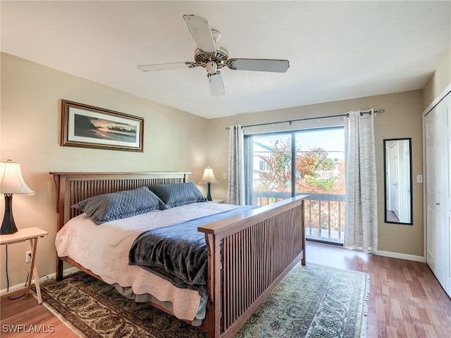 bedroom featuring access to exterior, wood-type flooring, ceiling fan, and a closet