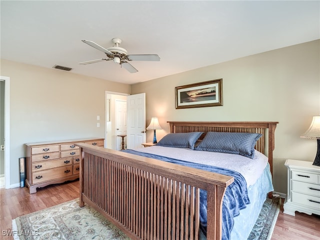 bedroom featuring ceiling fan and light hardwood / wood-style flooring