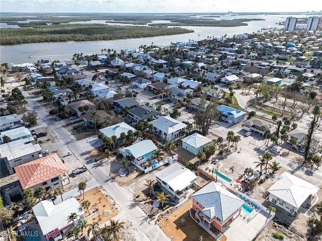 drone / aerial view with a water view