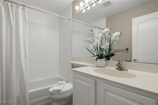 3517 Heron Glen Ct, Bonita Springs, FL 34134 - bathroom featuring toilet, shower / tub combo with curtain, and vanity