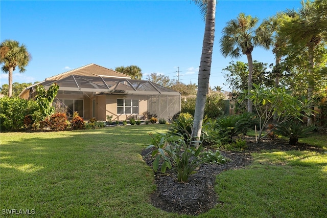 view of yard featuring a lanai