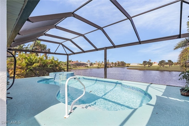 view of pool featuring a water view, a patio, and glass enclosure