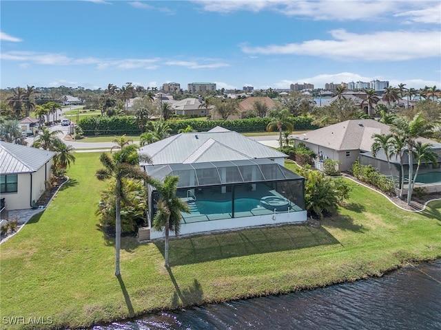 birds eye view of property featuring a water view