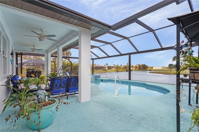 view of swimming pool with a water view, ceiling fan, a lanai, and a patio area