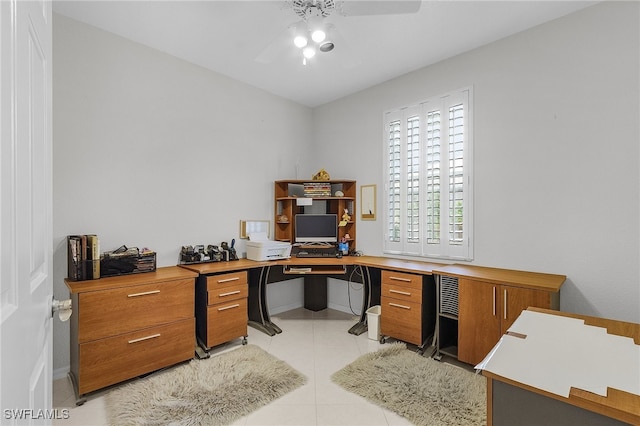 tiled home office with ceiling fan