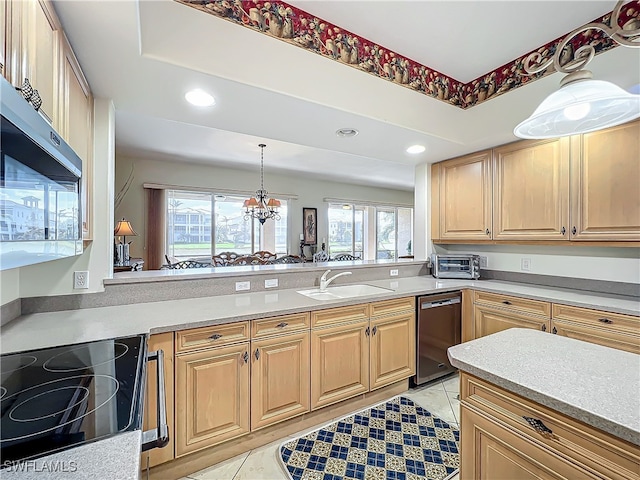 kitchen with light tile patterned flooring, sink, appliances with stainless steel finishes, and a notable chandelier