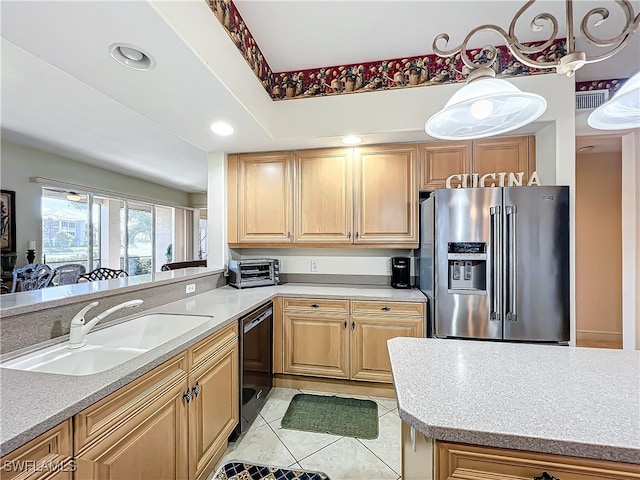 kitchen featuring light brown cabinetry, high quality fridge, sink, and black dishwasher