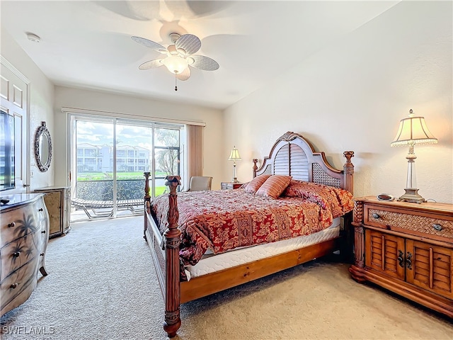 bedroom with light carpet, ceiling fan, and access to exterior