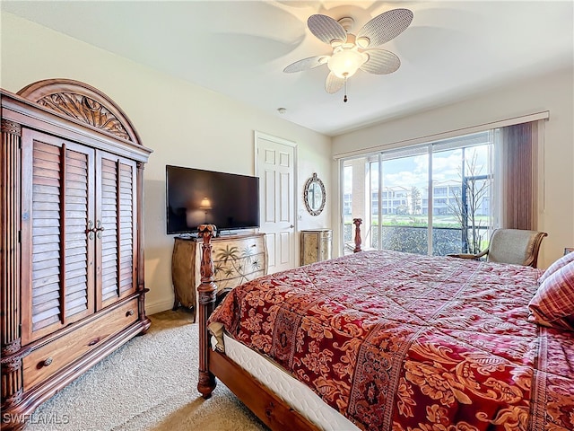 bedroom with access to exterior, carpet floors, and ceiling fan