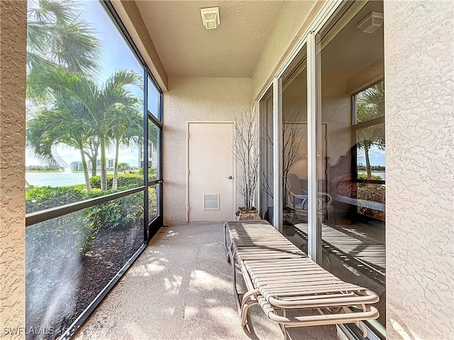 sunroom / solarium with a wealth of natural light