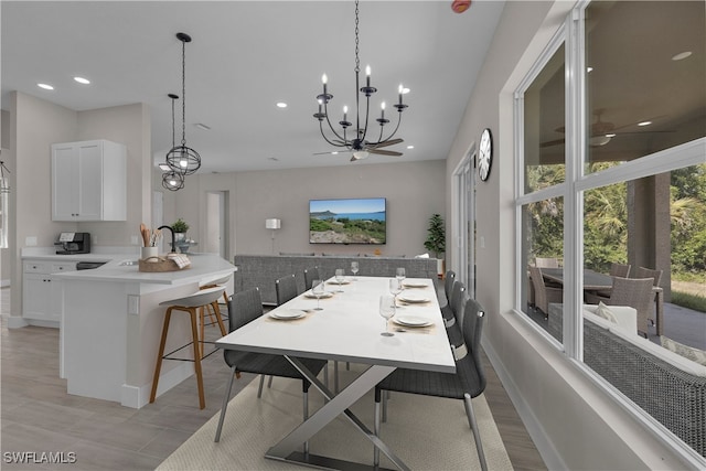 dining space with a notable chandelier