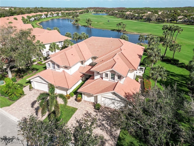 bird's eye view with a water view