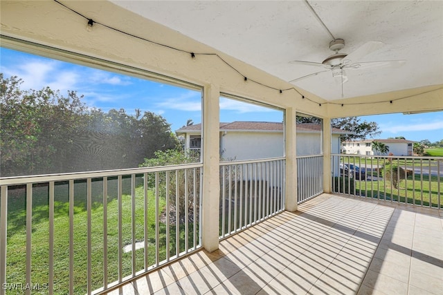 balcony featuring ceiling fan